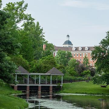 Shot of Bobcat Depot over a pond with a gazebo in sight.